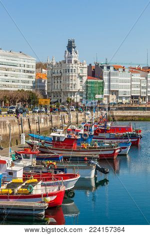 LA CORUNA, SPAIN -MARCH 26, 2012: Harbor of La Coruna, Galicia, Spain. The main port activities are fishing, coal, containers and oil.