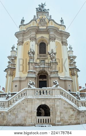 St. George Cathedral (build in 1746-1762, designed by architect Bernard Meretyn and sculptor Johann Georg Pinsel) in Lviv, Ukraine. Overcast early morning winter cityscape in the center of Lviv city.