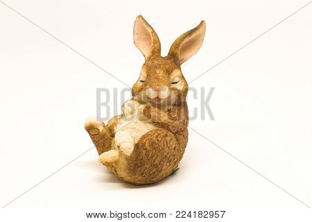 Sleepy easter bunny with friend and glass eggs