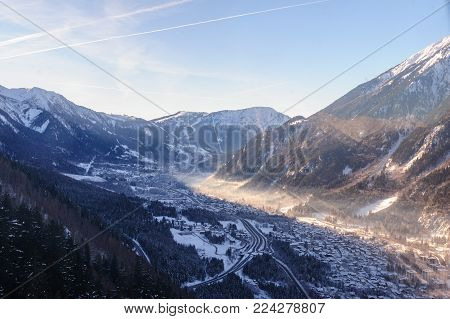 The Mont Blanc and the Valley near Chamonix de Mont Blanc, as seen from the Cable Car to the Aiguille du Midi