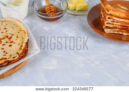 Traditional Ukrainian or Russian pancakes. Shrovetide Maslenitsa. Traditional dishes on the holiday Carnival Maslenitsa Shrovetide