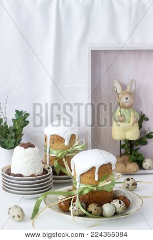 Easter Still Life With Easter Cake Kulich, Paskha And Painted Eggs On A Light Background.
