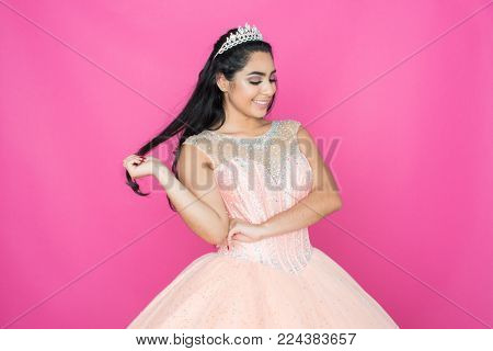 Teen hispanic girl competing in a beauty pageant