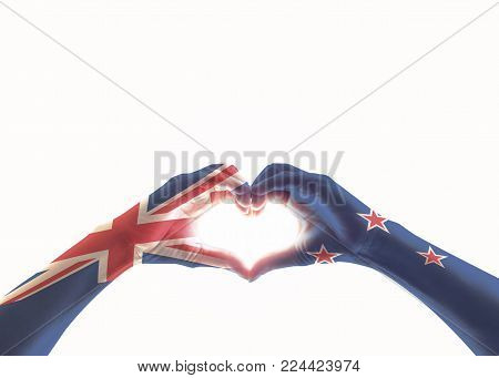 New Zealand Flag On People Heart Shaped Hands Isolated On White Background (clipping Path) For Nz Na