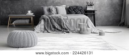 Grey Pouf In Bedroom Interior