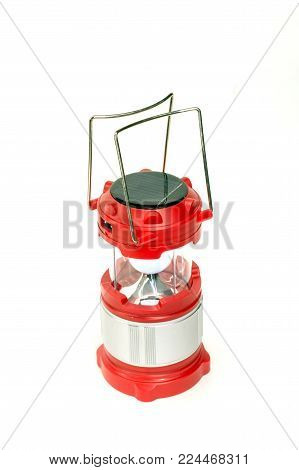 flashlight solar-powered red on a white background