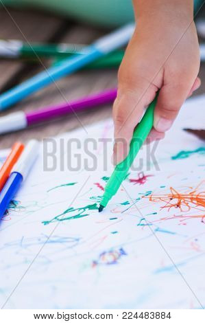 Adorable Little Girl Drawing With Felt-tip Pens Outdoors, Closeup. Summer Leisure. Talantes Kids, Ea