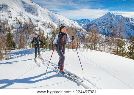 A Couple Of Women Practice Ski Mountaineering