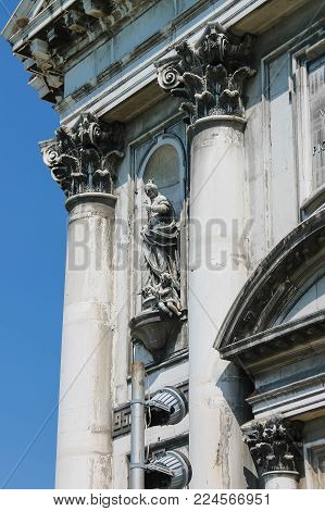 Old statue on facade of the Church of Santa Maria del Rosario (Gesuati). Venice, Italy