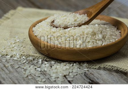 Rice in spoon and bowl. Jasmine Rice Thai Rice White Rice.