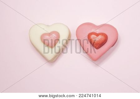 happy valentines, photograph of two heart-shaped cakes on a pink background