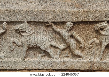 Stone Bas-reliefs On The Ruins Of A Hindu Temple Near The Vittala Temple In Hampi, Karnataka, India.