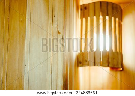 The interior of the sauna - shelves, window, lamp, nobody
