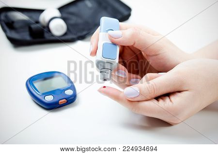 Diabetes Doing Blood Glucose Measurement.
