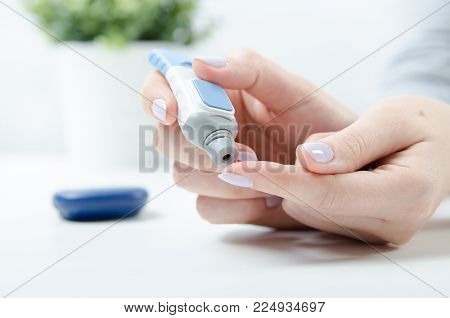 Diabetes Doing Blood Glucose Measurement.