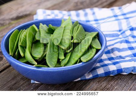 Blue Bowl With Green Peapods