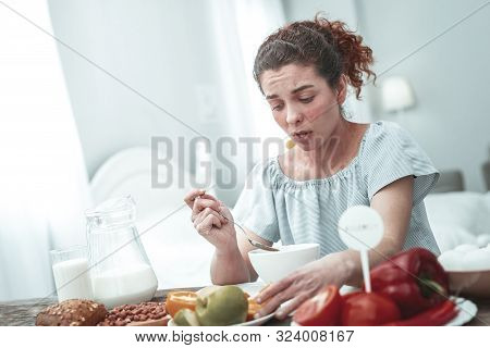 Young Curly Woman With Skin Rash Having Strong Allergy To Gluten