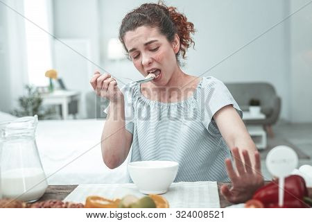 Woman With Rash Over All Body Having Breakfast Full Of Allergens