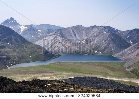 The Picturesque Lake Ketachan In Kamchatka, Russia. Bystrinsky National Park, Near The Volcano Ichin