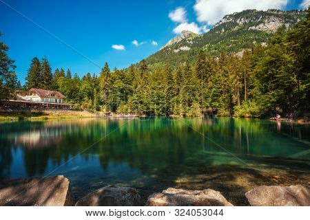 Mountain Lake Blausee Located In The Kander Valley Above Kandergrund In The Jungfrau Region. Long Ex