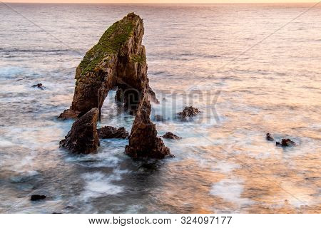 Long Tme Exposure Of Crohy Head Sea Arch Breeches During Sunset - County Donegal, Ireland