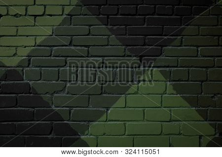 Camouflage Green Color Brick Wall Texture Background. Surface With Various Squares And Rhombuses. Ab