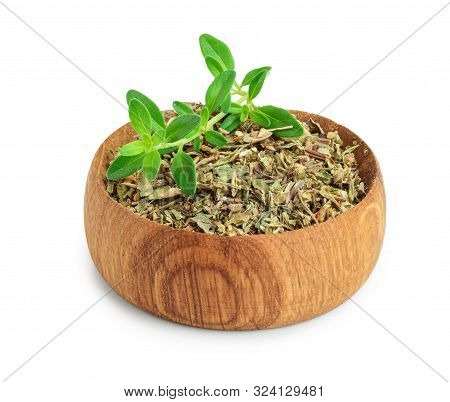 Dried Thyme Leaves In The Wooden Bowl, With Fresh Thyme Isolated On White Background