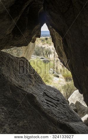 Anthropomorphic Engravings Under Granite Boulder Of Natural Monument Of Los Barruecos, Extremadura, 