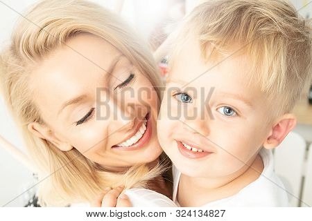 Mother With Little Boy Having Fun Together.