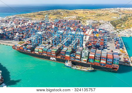 Huge Apl Cargo Ship For Transporting Containers In Port At Unloading. Malta, Il Brolli Marsaxlokk, M