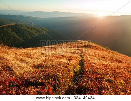 Mountain Trail, Hiking Road On Sunset Sky Background, Travel And Toursm In The Wild Nature