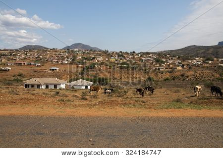Housing And Huts Scattered Informally On Hill In Rural South Africa