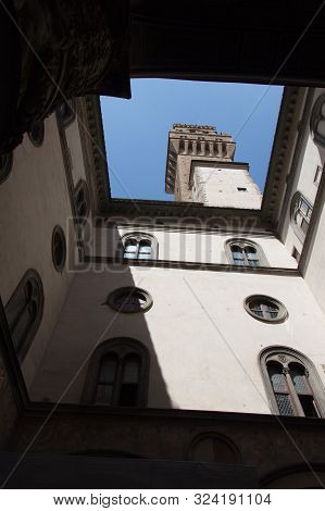 Italy, Florence - May 18 2017: The View Of Arnolfo Tower From Inner Yard At Palazzo Vecchio On May 1