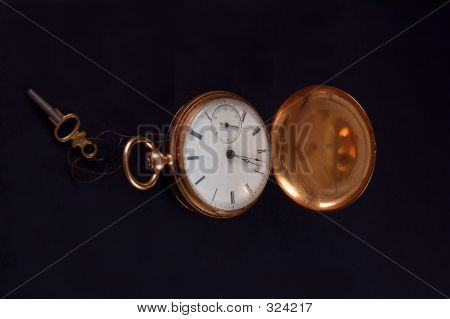 Starožitné zlaté kapesní hodinky