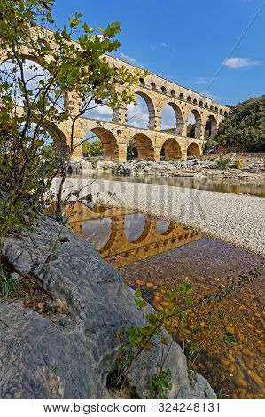 Remoulins, France, September 20, 2019 : The Pont Du Gard, The Highest Roman Aqueduct Bridge, And One