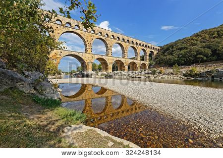 Remoulins, France, September 20, 2019 : The Pont Du Gard, The Highest Roman Aqueduct Bridge, And One