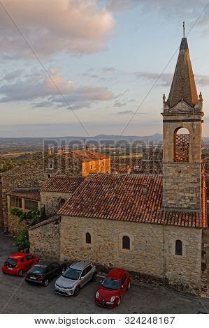 Bessas, France, September 20, 2019 : Sunset Lights On The Church Of The Village Among The Vineyards.