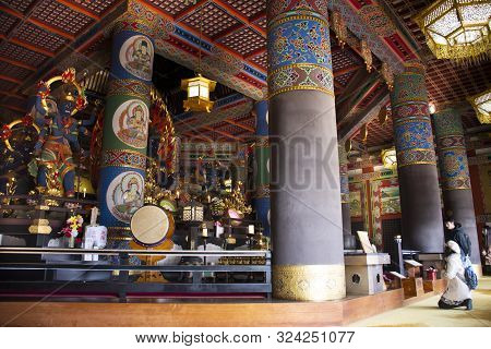 Japanese People And Thai Women Visit And Praying Fudo Myoo Or Acala In Daitou Or Great Peace Pagoda