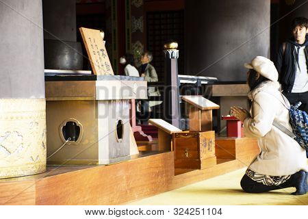 Japanese People And Thai Women Visit And Praying Fudo Myoo Or Acala In Daitou Or Great Peace Pagoda 