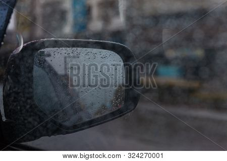 Water Drop On Wind Shield. Rain Drops On Window.raindrop Outside Car Mirror.