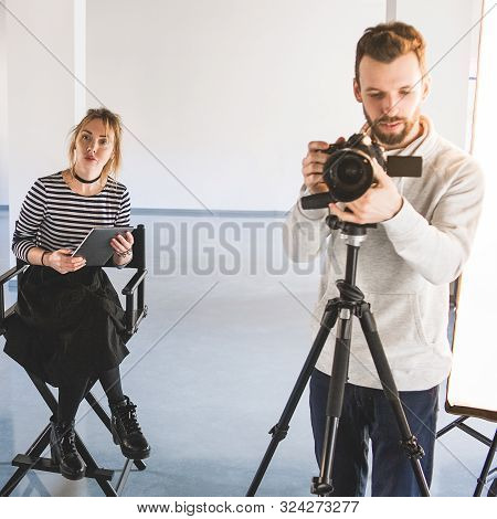 Photography Project. Creative Process Teamwork. Female Art Director Leading Man Shooting.