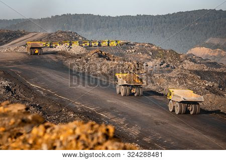 Big Yellow Mining Truck For Anthracite. Open Pit Mine, Extractive Industry For Coal