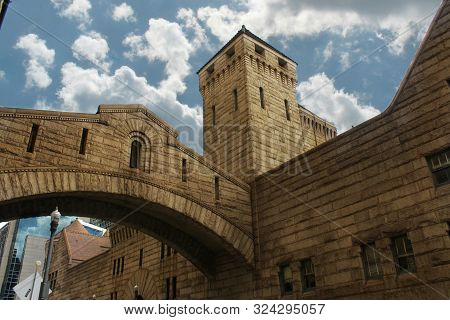 Brick Stone Building With Bridge Windows Cloudy Sky