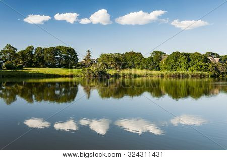 Biddeford Pool Maine Water Scene On The Lake With Cloud Reflexed On The Water