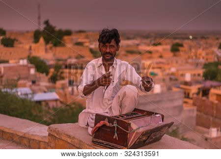 Jaisalmer, Rajasthan, India - July 29, 2019 : Indian Musicians In Traditional Dress Playing Musical 