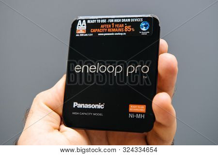 Paris, France - Sep 13, 2019: Man Hand Holding Panasonic Eneloop Pro High Capacity Modern Ni-mh Batt