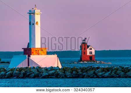 Mackinac Island Mi /usa - July 9th 2016: The Twin Lighthouses Of Mackinac Island At Sunset