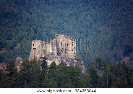 View On Ruins Of Ancient Castle  Likava Among The Forest. Liptov Region. Slovakia.  Tourist Attracti
