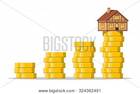 Residental House Building On Top Of Pile Of Gold Coins Growing Up. Saving Money For Home. Real Estat