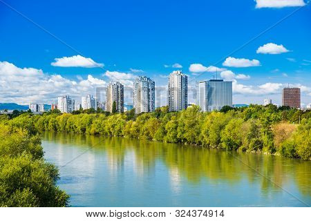 Croatia, City Of Zagreb, Surface Of The Sava River And Modern Towers Skyline In Autumn Day